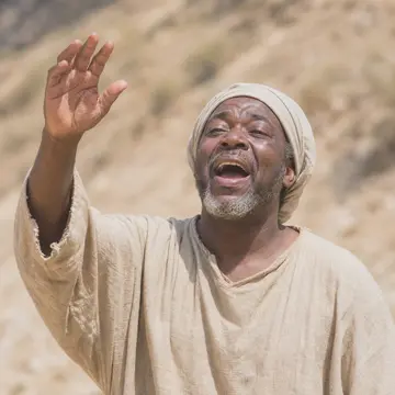 One singer from the original robed choir